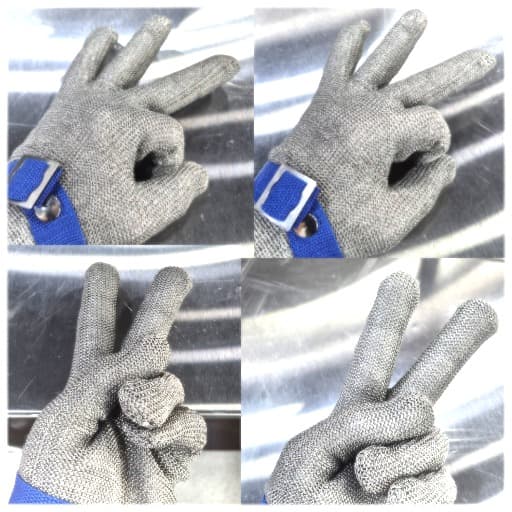 Kitchen safety gloves signalling OK and peace signs